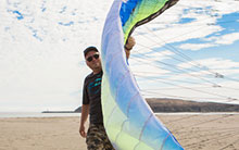 Man on Doran Beach with Kite
