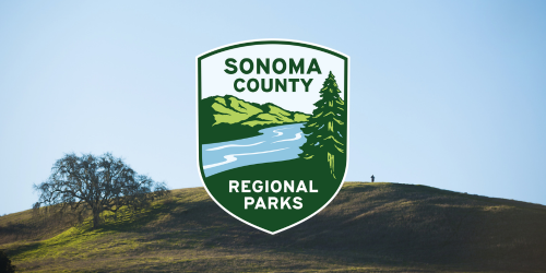 Sonoma County Regional Parks new logo with Taylor Mountain Regional Park in the background