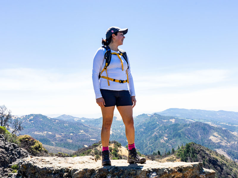  a woman surveys the view from atop Gunsight Rock at Hood Mountain Regional Park and Open Space Preserve.