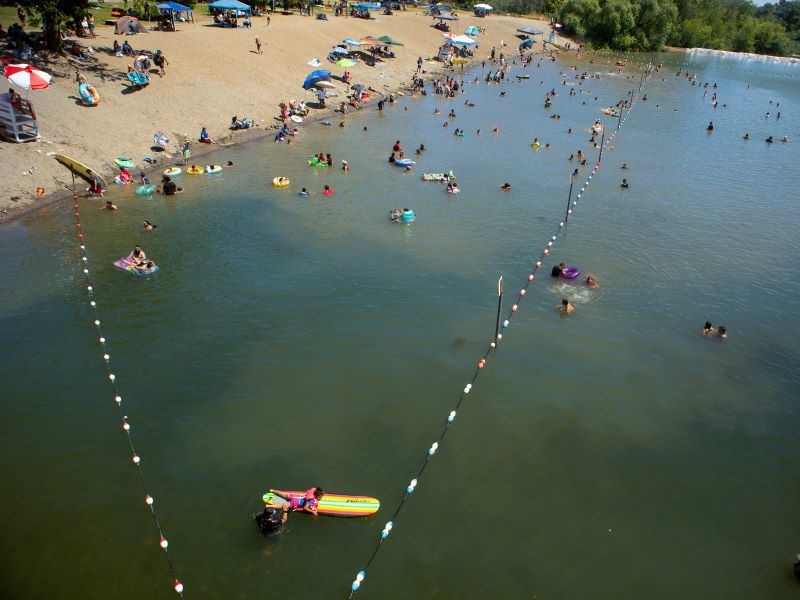 Swimmers in the water at Healdsburg Veterans Memorial Beach