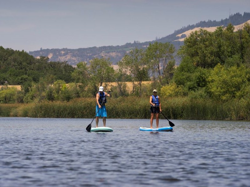 Two people paddle at Spring Lake Regional Park