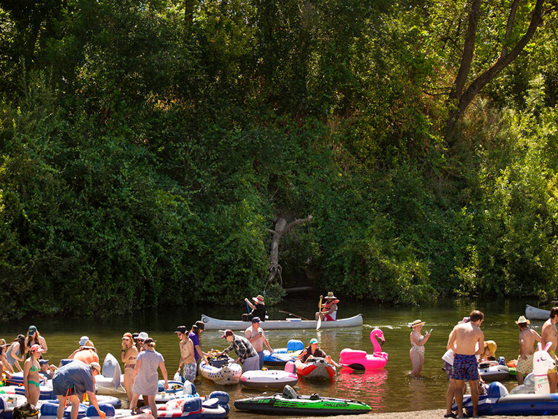 crowded river beach during summer
