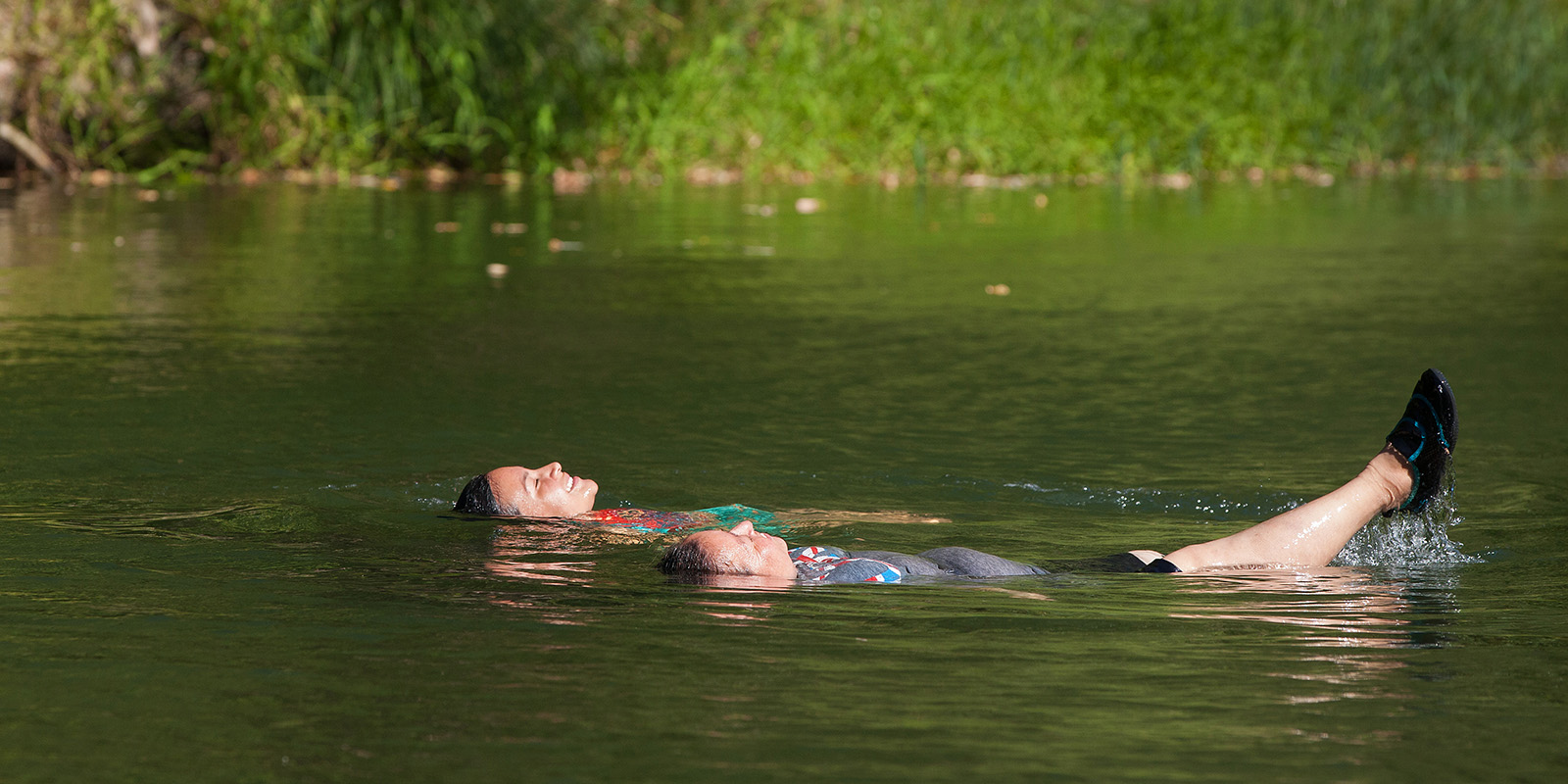 Two women floating on the Russian River