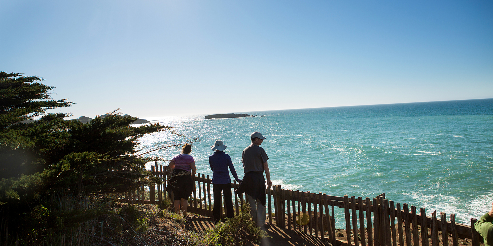 People look out over ocean at Gualala Point Regional Park