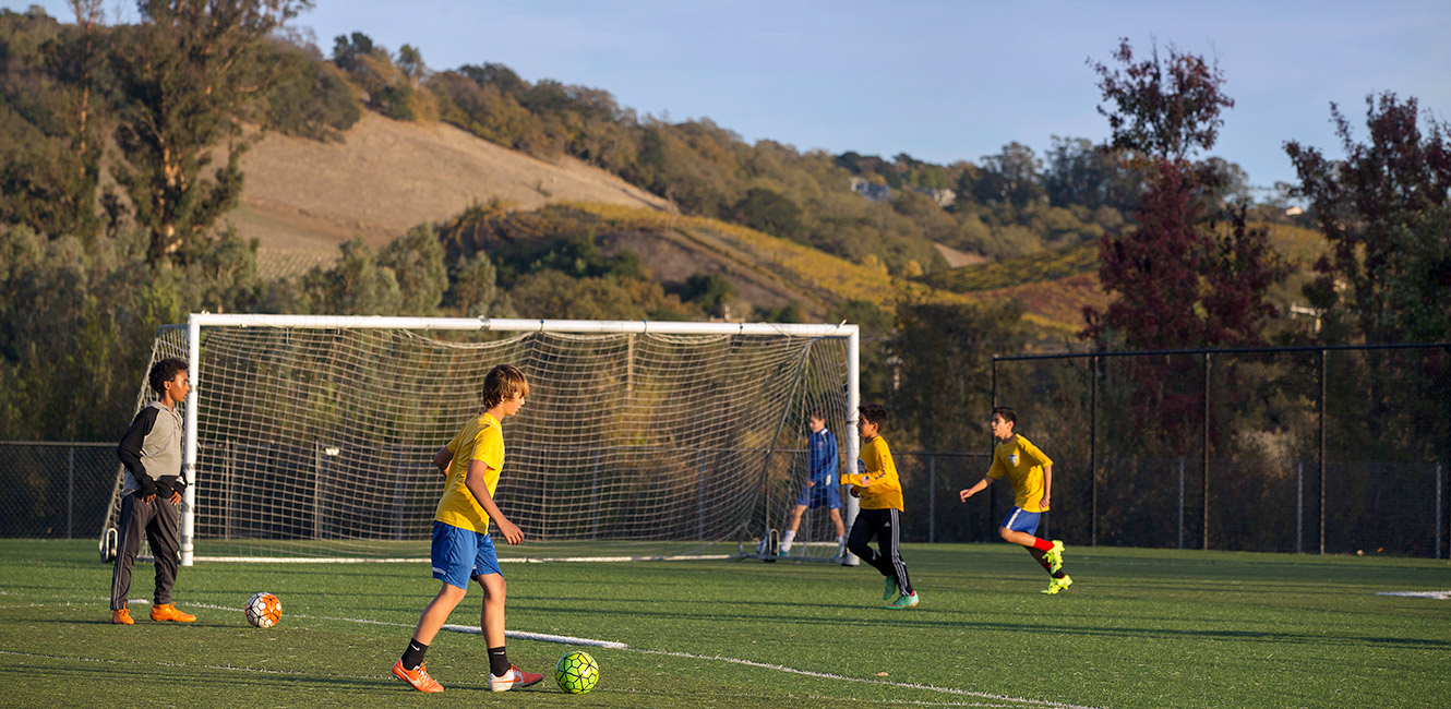 Playing soccer at Tom Schopflin Fields