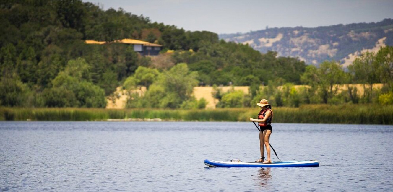 Stand-up paddle boarding at Spring Lake Regional Park 